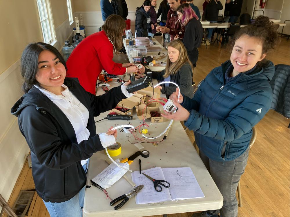 Field technician, Tatiana Elizondo and Fisheries Biologist, Delaney Adams at electronics training for light trap fabrication (March 2023).